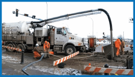 Lacombe water crew repairing link